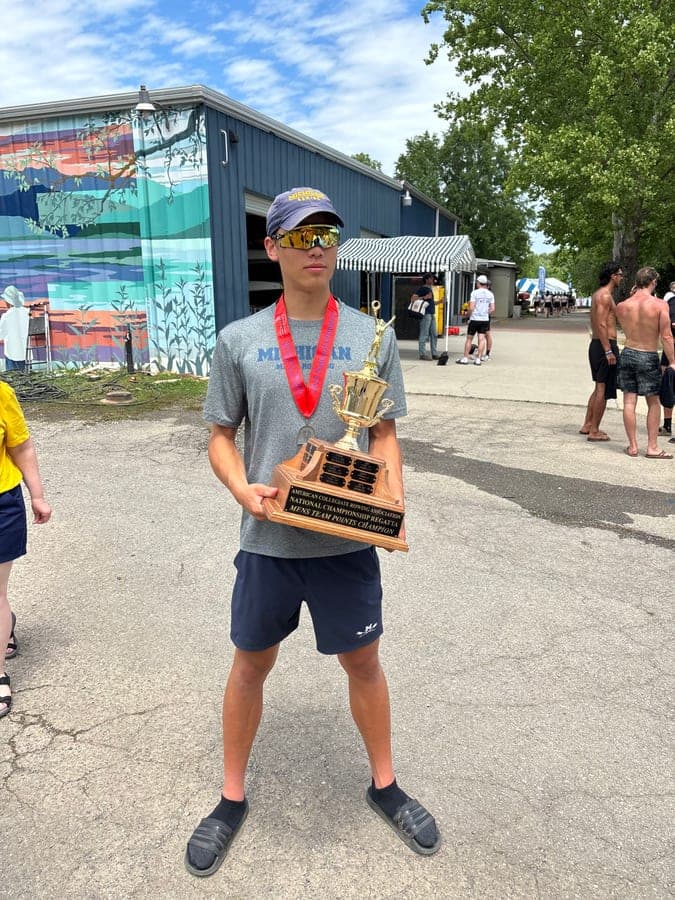 Holding the ACRA national championship team points trophy at the regatta site